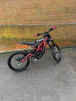 Sur-Ron LB X-Series Dual Sport Electric Dirt Bike. Key features include:  Type: Electric dirt bike Model: LB X-Series Brand: Sur-Ron Top Speed: 45 mph + Range: 20-60 miles per charge, depending on mode and conditions Charge Time: 2.5 to 3.5 hours Weight: 121 lbs Street Legal: Generally not street legal, designed for off-road use Age to Ride: 16+ with CBT Certificate for road-legal versions Battery: 104V/55Ah Climbing ability: Over 45°