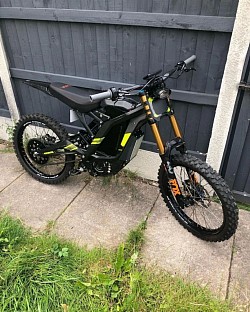 2024 SURRON Light Bee X Electric Bike. Key features include:  Type: Electric dirt bike Handling: Easy to handle with no clutch or gears Maintenance: Low maintenance and economical Off-road capability: Suitable for tackling tough trails Range: Up to 80 miles on a single charge, depending on conditions Top speed: Around 47 mph (73 km/h), varying with load and gearing Weight: Approximately 47 kg plus the battery Battery: 60V 40Ah Motor: 6kW
