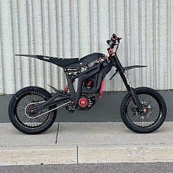Talaria Sting electric dirt bike, also known as Milk Racing. Key features include:  Type: Electric dirt bike.  Brand: Talaria, sometimes referred to as Milk Racing.  Use: Designed for off-road and potentially on-road use, depending on local regulations.  Components: Features a robust frame, long-travel suspension, knobby tires, and an electric motor.  Customization: Often customized with aftermarket parts for enhanced performance and aesthetics.  Availability: Parts and accessories are available from various retailers.  Maintenance: Requires regular maintenance, similar to other bikes, including brake and tire checks.  Safety: It is a less-lethal weapon but not a toy.