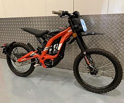 SUR-RON Light Bee X Electric Bike. Key features include:  Type: Electric dirt bike Range: Approximately 40-80 miles on a full charge, depending on conditions Top Speed: Up to 47 mph (73 km/h) Weight: 47 kg plus battery Motor: Brushless electric motor Battery: 60V Wheels: 19-inch spoke wheels Suitable for: Both beginners and experienced off-road riders