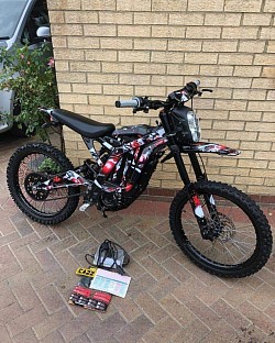 Sur-Ron Light Bee X, an electric dual-sport dirt bike. Key features:  Type: Electric dirt bike Power: 60V, over 6kW peak power Battery: Removable Panasonic Lithium-ion Speed: Up to 45 mph when de-restricted Legality: Primarily for off-road use, may not be street legal in all areas Features: Some models include headlight, brake lights, turn signals, and passenger pegs for street legal use Weight: 47kg plus battery Alternative: Rawrr Mantis X is a budget-friendly alternative