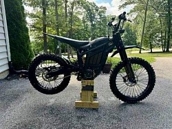 Talaria Sting, which is an electric dirt bike. Helpful information includes:  It is designed for off-road use.  The Talaria Sting R MX4 can reach speeds of up to 53 mph.  It has a maximum range of approximately 78 miles.  Some models are street legal and can be ridden with a valid CBT license by individuals 16 and older.  It's important to check local regulations regarding e-bike wattage and speed limits, as some areas have restrictions.  The price for a Talaria Sting R MX4 can be around €2500.  It is advisable to ride cautiously in wet conditions and avoid heavy rain or snow.