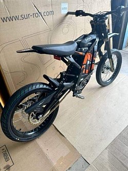 SUR-RON Light Bee X electric bike, known for blending dirt bike and mountain bike features. Key details include:  Type: Electric, off-road Motor: 250N Speed: Up to 45-50 mph after unlocking the speed limiter Range: 40-60 miles on a single charge, depending on usage Age Requirement: Riders should be at least 16 years old, but local regulations may vary Legality: Primarily for off-road use and not street-legal