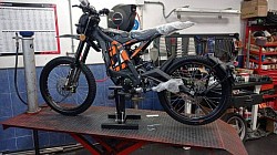 SUR-RON Light Bee X Electric Bike. Key features include:  Type: Part dirt bike, part mountain bike, all-electric. Speed: Up to 47 mph, depending on conditions. Range: 40-80 miles on a single charge, influenced by riding conditions. Motor: Brushless electric. Tires: 19-inch spoke wheels with CST tires. Weight: 47 kg plus battery. Interchangeable parts: Parts are interchangeable with Talaria and Surron models.