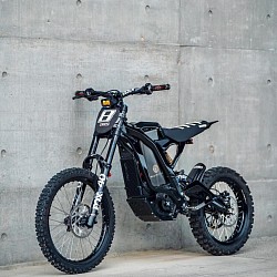 2024 SURRON Light Bee X Electric Bike. Key features include:  Type: Electric dirt bike Motor: 7kW electric motor Top Speed: Around 45-50 mph (72-80 km/h) Range: 40-75 km (25-47 miles), depending on riding conditions Weight: 57 kg Charging Time: 2.5 to 3.5 hours Street Legal: Can be made street legal with necessary attachments and registration Age Restrictions: Minimum 16 years old, but check local regulations
