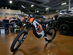 2024 SURRON Light Bee X Electric Bike. It is a lightweight electric dirt bike, blending elements of a mountain bike and a motorcycle.  Key features include:  Electric Motor: Offers instant torque and quiet operation. Top Speed: Around 47 mph (73 km/h). Range: Approximately 40-80 miles on a single charge, depending on conditions. Weight: 47 kg plus the battery. Wheels: 19-inch spoke wheels. Battery: Some models offer upgraded batteries for extended range.