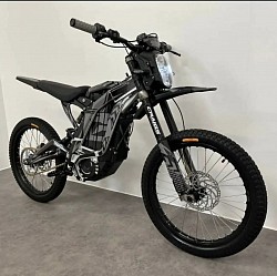 Surron Light Bee X, an electric dirt bike. Helpful information:  It's designed for off-road use but can be made street legal with mirrors and registration.  It has a top speed of around 45-50 mph.  The range is approximately 40-80 miles on a single charge, depending on riding conditions.  It features both Sport and Eco modes.  The bike weighs around 104 pounds.  Age restrictions may apply, so it's important to check local regulations.