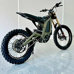 2024 SURRON Light Bee X Electric Bike, also known as Surron X. It's an electric dirt bike known for its agility and off-road capabilities.  Key features include:  Type: Electric dirt bike Motor: 7KW electric motor Top Speed: Around 47 mph (73 km/h) Range: 40-80 miles on a single charge, depending on conditions Battery: 60V Tires: 19-inch Weight: 47 kg plus battery Brakes: Disc brakes